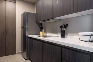 Fridge, microwave, stovetop, coffee/tea maker