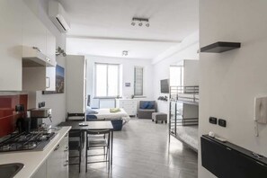 Fridge, microwave, stovetop, coffee/tea maker