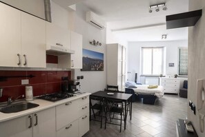 Fridge, microwave, stovetop, coffee/tea maker