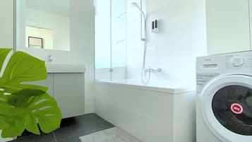 Shower, hair dryer, towels