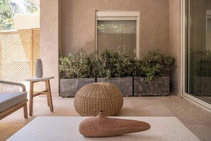Deluxe Room, Garden View | Terrace/patio