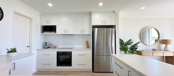 Luxury Waterfront | Sleeps 4 | Resort Pool | Wifi