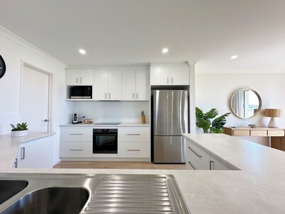 Luxury Waterfront | Sleeps 4 | Resort Pool | Wifi