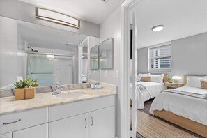 Shower, hair dryer, towels