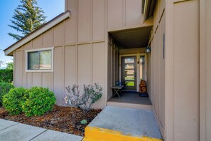 A residential building with a front porch, a small table, and a potted plant. - Uptown Abode 4 Mi to Dtwn Pagosa Springs (Pagosa Springs)