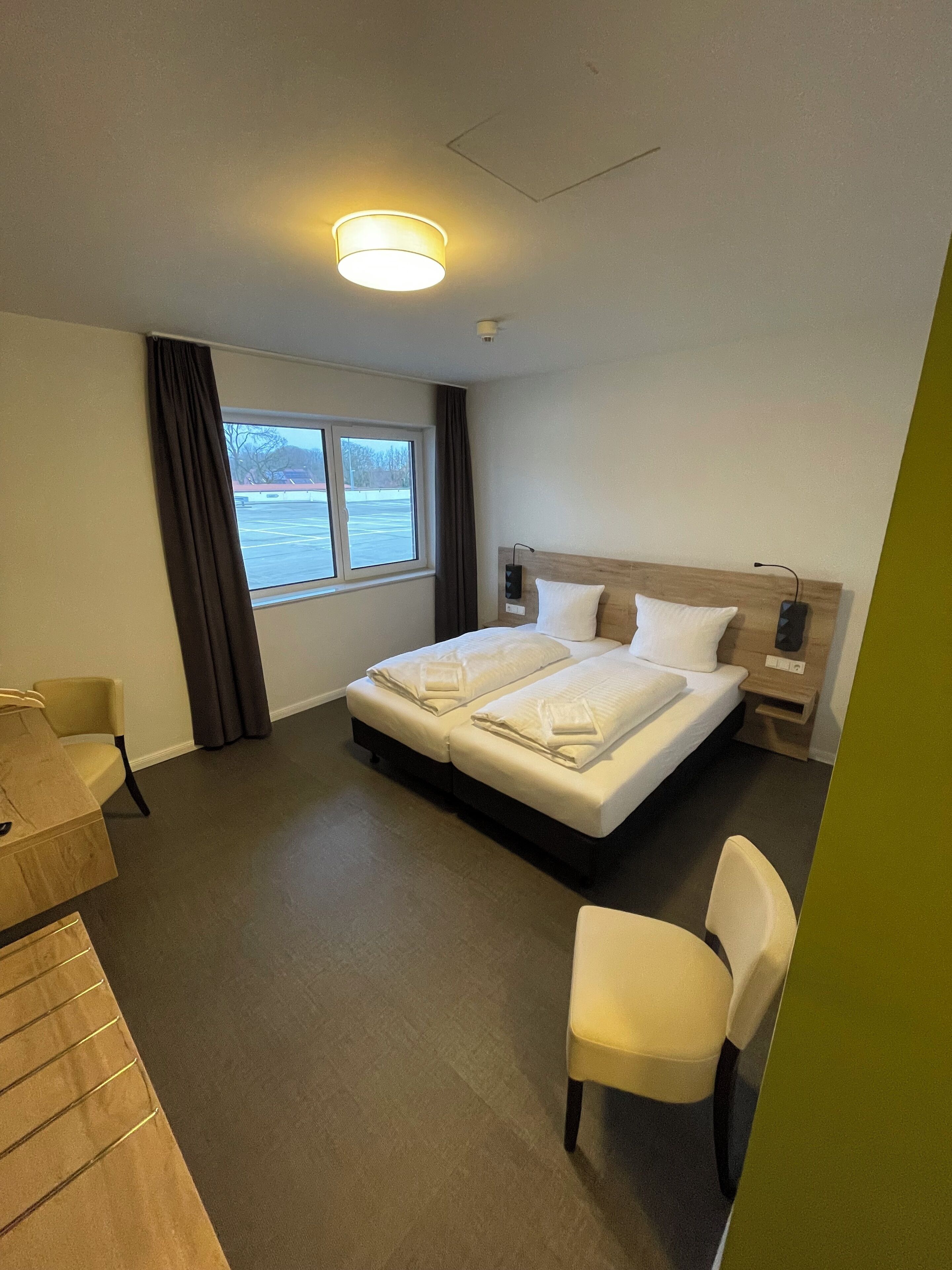 Desk, laptop workspace, blackout drapes, soundproofing