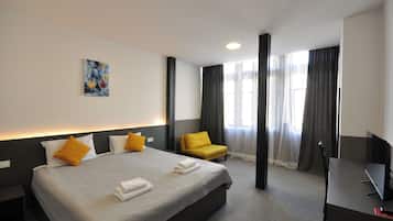 Deluxe Double Room, River View | Desk, laptop workspace, blackout curtains, soundproofing