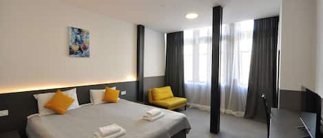 Deluxe Double Room, River View | Desk, laptop workspace, blackout drapes, soundproofing
