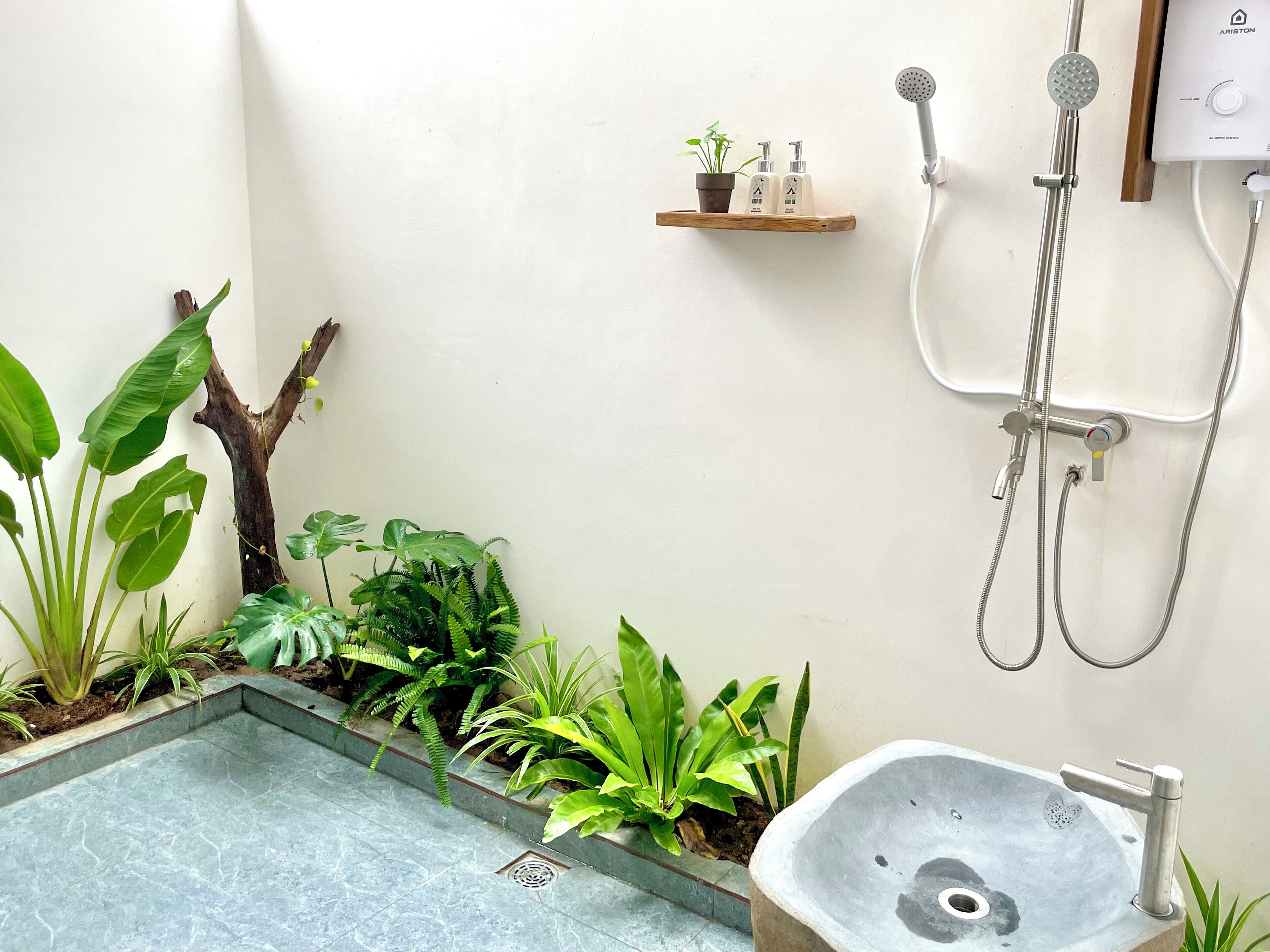 Quadruple Room, Balcony, Garden View | Bathroom | Shower, hair dryer, slippers, towels