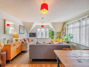 A cozy room with a bed, a desk, a dining table, and a TV. - 8 bedroom accommodation in Bluebell Hill, near Chatham (Bluebell Hill, near Chatham)