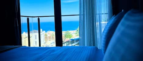 Deluxe Room, Balcony, Sea View | Egyptian cotton sheets, premium bedding, pillow-top beds, minibar