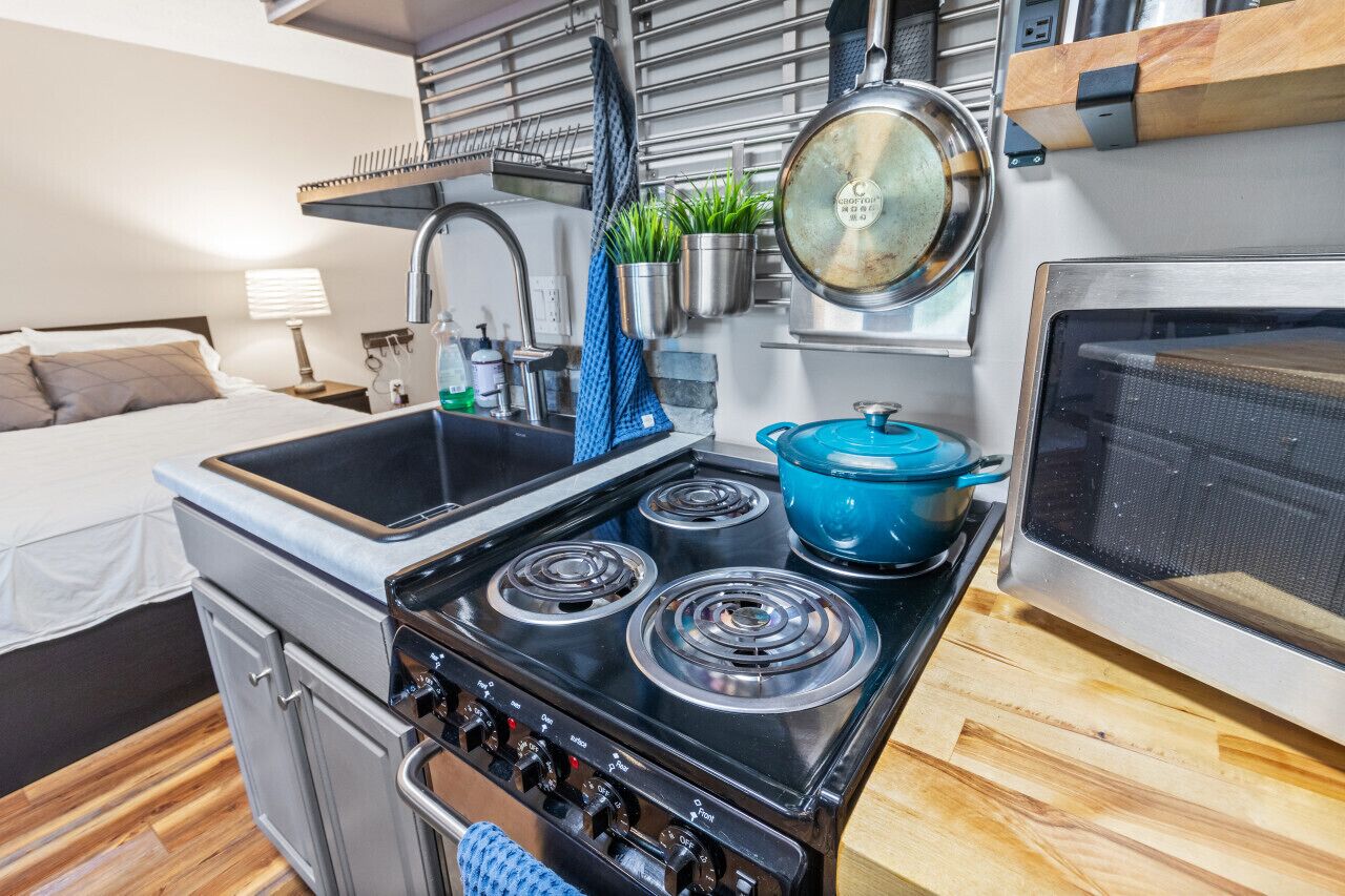 Fridge, microwave, stovetop, coffee/tea maker