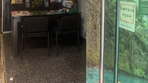 A reception area with a counter, chairs, a television, and a poster advertising 'Xcaret Mexico'. - Room with balcony at BLVD Hotel, fifth avenue (Playa del Carmen)