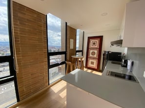 Business Apartment, 1 Queen Bed, Kitchen | Private kitchen | Mini-fridge, microwave, stovetop, coffee/tea maker
