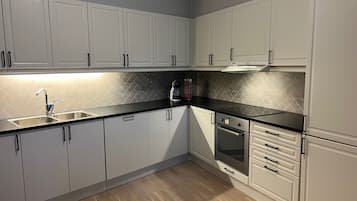 Apartment | Private kitchen | Fridge, microwave, oven, stovetop