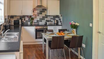 Dishwasher, highchair, cookware/dishes/utensils