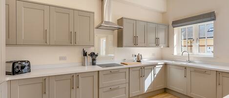 Dishwasher, high chair, cookware/dishes/utensils