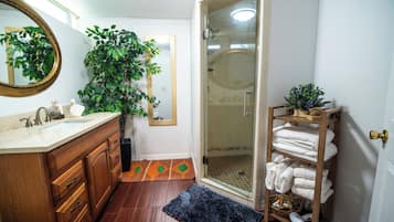 Shower, hair dryer, towels, soap