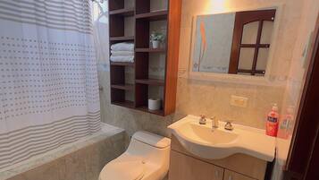 Hair dryer, towels, soap, shampoo