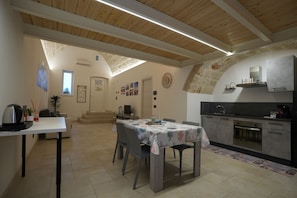 Classic Apartment (Ground floor) | Living area | Flat-screen TV, toys - La Casetta (Mola di Bari)