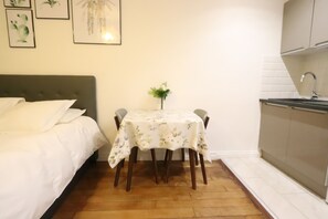 1 bedroom, desk, iron/ironing board, travel cot