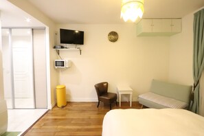 1 bedroom, desk, iron/ironing board, travel cot