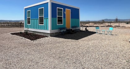 Cozy Beach House tiny home in tranquil Beryl Utah with AC, WiFi, fitness room.