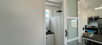 Cozy Beach House tiny home in tranquil Beryl Utah with AC, WiFi, fitness room.