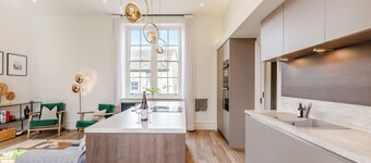 Upstairs is a stylish duplex apartment oozing luxury accommodation throughout.