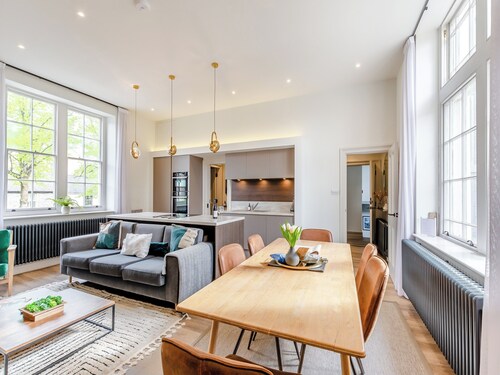 Upstairs is a stylish duplex apartment oozing luxury accommodation throughout.