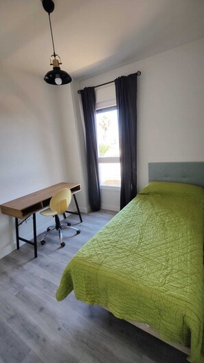 3 bedrooms, desk, iron/ironing board, travel cot