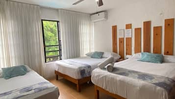 Family Room, Courtyard View | Bed sheets