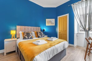 1 bedroom, desk, iron/ironing board, travel cot