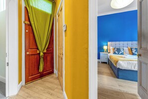 1 bedroom, desk, iron/ironing board, travel cot