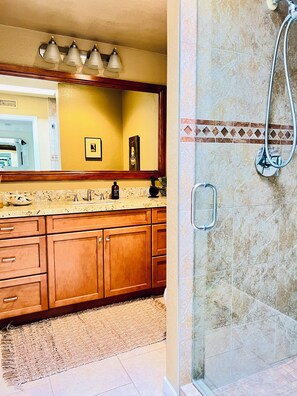 Shower, eco-friendly toiletries, hair dryer, towels