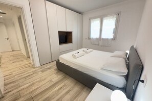 2 quartos, ferros/tábuas de passar roupa, berço de viagem, Wi-Fi