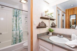 Eco-friendly toiletries, hair dryer, towels