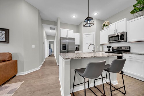 This charming 3-bedroom, 2-bathroom house comfortably sleeps 7.