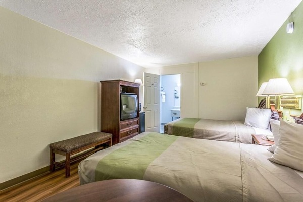 Unit with 2 Double beds. Exact unit will be assigned upon arrival. Views, colors, and decor may vary.