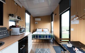 1 bedroom, bed sheets - Bruce Farm Alpaca Cabin 1 by Tiny Away (Hillend)