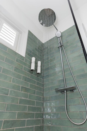 Shower, hair dryer, towels, soap