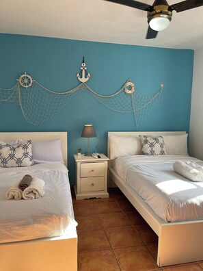 Deluxe Apartment, Patio, Garden View | 2 bedrooms, laptop workspace, blackout drapes, iron/ironing board