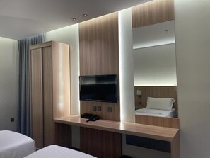 1 chambre, fer et planche à repasser, Wi-Fi gratuit, draps fournis