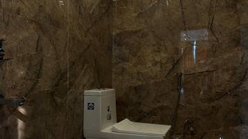 Luxury Double Room, City View | Bathroom | Shower, towels, soap, shampoo