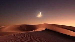 A desert landscape with sand dunes and a crescent moon in the sky. - Douz Trek (Douz Sud)