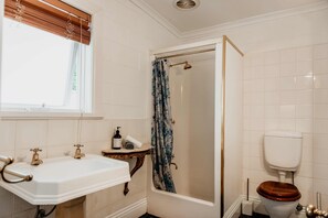 Room, 1 Queen Bed with Sofa bed | Bathroom | Hair dryer, slippers, towels, soap - The Rabbit Hole Inn at Harvest Home (Avenel)