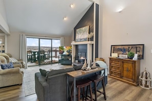 Smart TV, fireplace, foosball, books