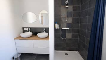 Shower, hair dryer, towels, soap