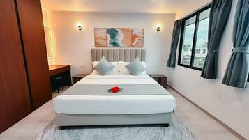 Family Suite, 2 Bedrooms, Pool View | Premium bedding, in-room safe, individually decorated