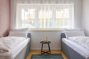 2 dormitorios, tabla de planchar con plancha, wifi y ropa de cama